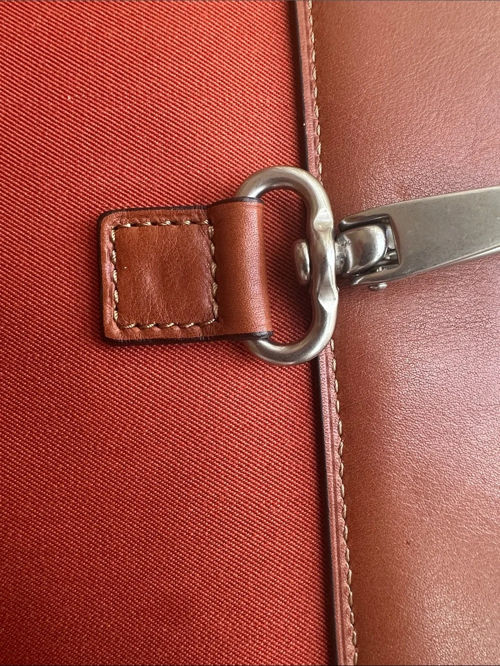 Trafalgar men’s messenger bag burnt orange with leather trim! Live New